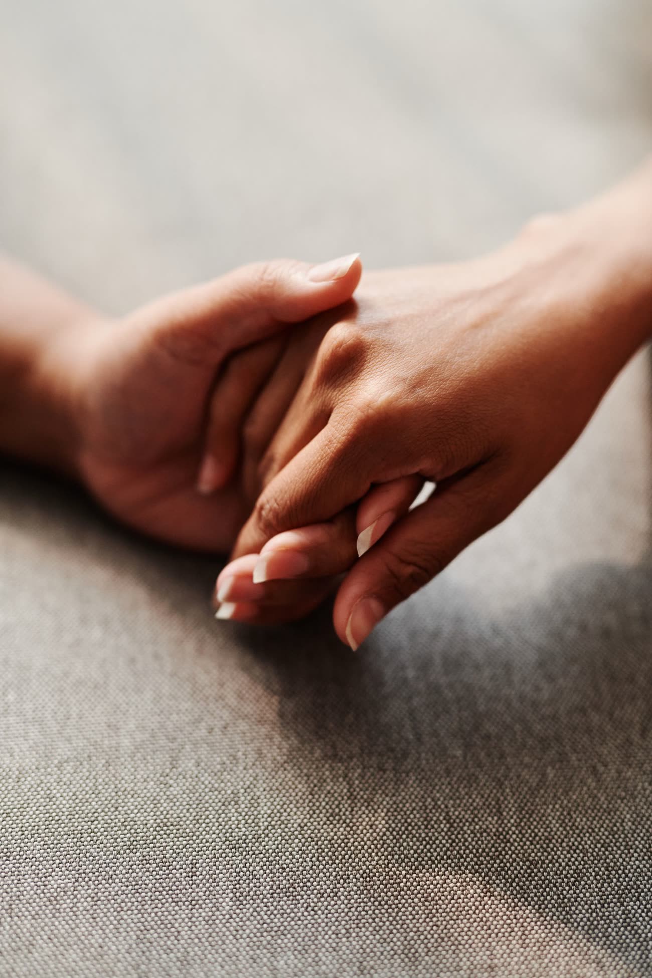 Comforting hands held together