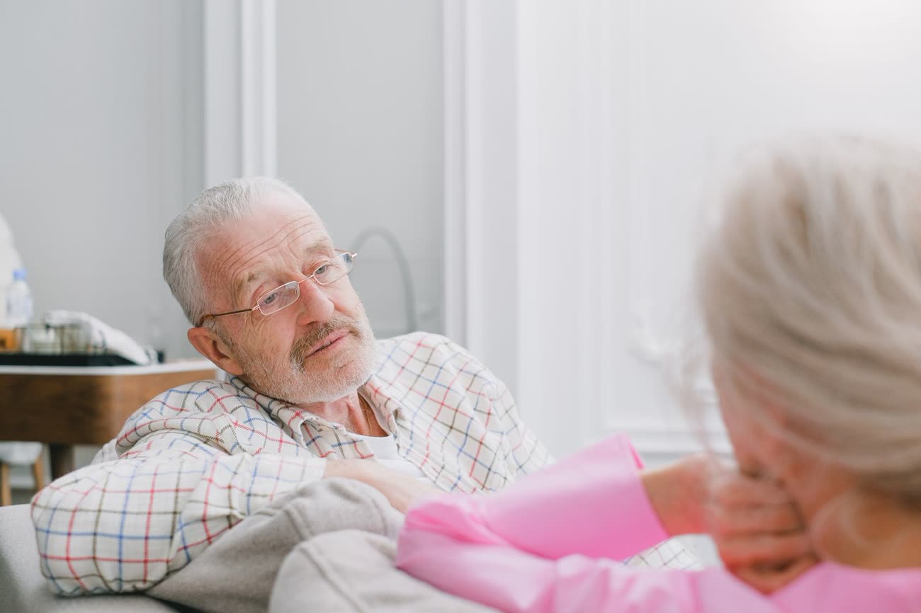 Two people talking calmly across a table